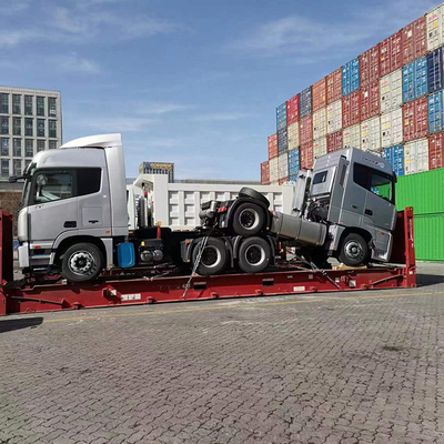 中国貨物代理店からの貨物 (RORO/OOG) ダンプトラックとコンクリートミキサーとトラクター